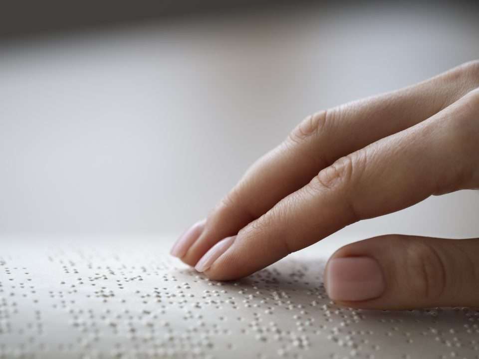 blind person reading home