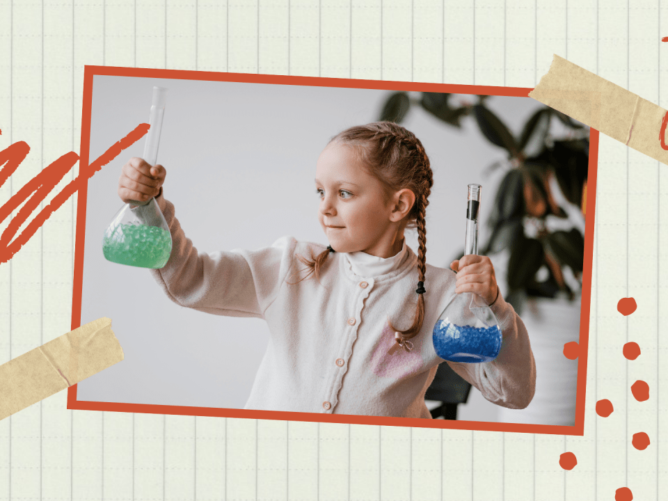 Interessiertes Kind mit Reagenzgläsern in den Händen